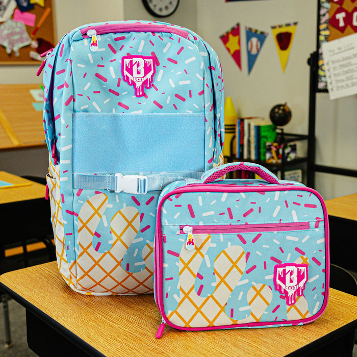 Adult model wearing blue lunch box with "Cotton Candy Ice Cream SZN 2" design