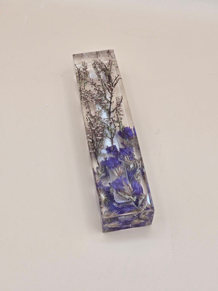 Resin mezuzah case with preserved purple flowers