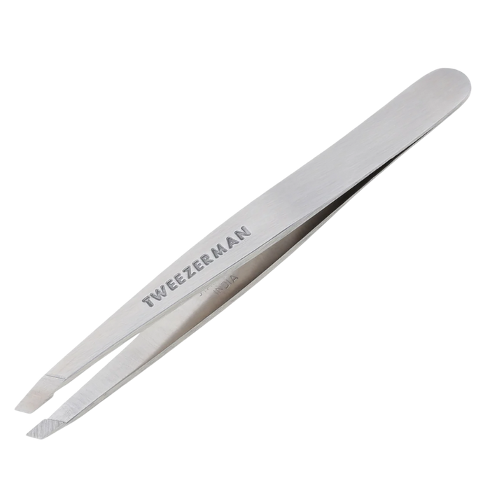 Tweezer with 'Tweezerman' branding on a white background