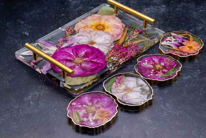 Landscape photo of a pressed flower 12x8 geode tray and coaster bundle with mixed dried blooms