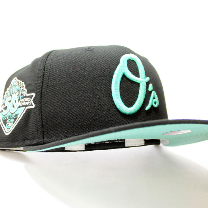 Baltimore Orioles 50th Anniversary 59Fifty New Era Fitted Hat (Glow in the Dark Black Mint Under Brim)