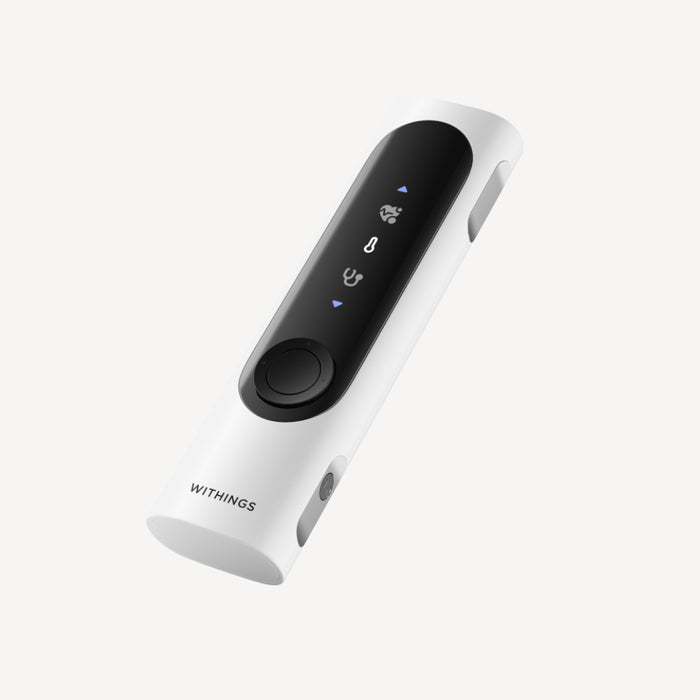 Withings BeamO — Beam-O — Three-quarter view on white background, black front panel with medical icons and central button — white, black, three-quarter, neutral background