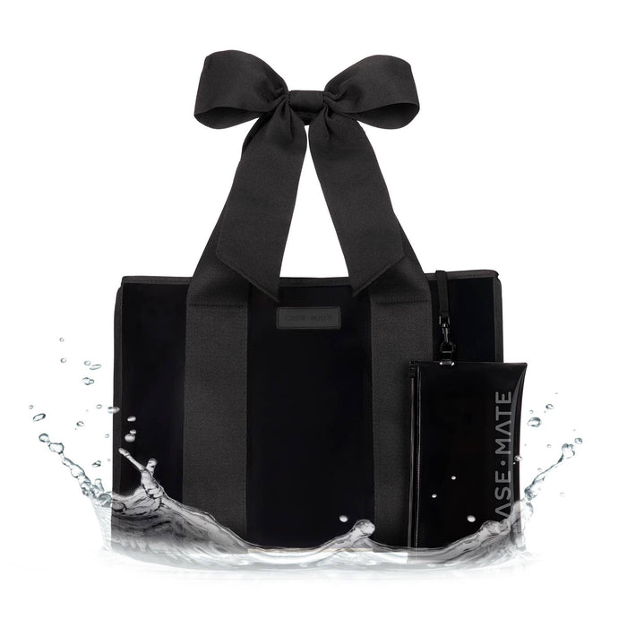 Black tote bag with a large bow and a black pouch labeled 'CASE-MATE' on a white background.