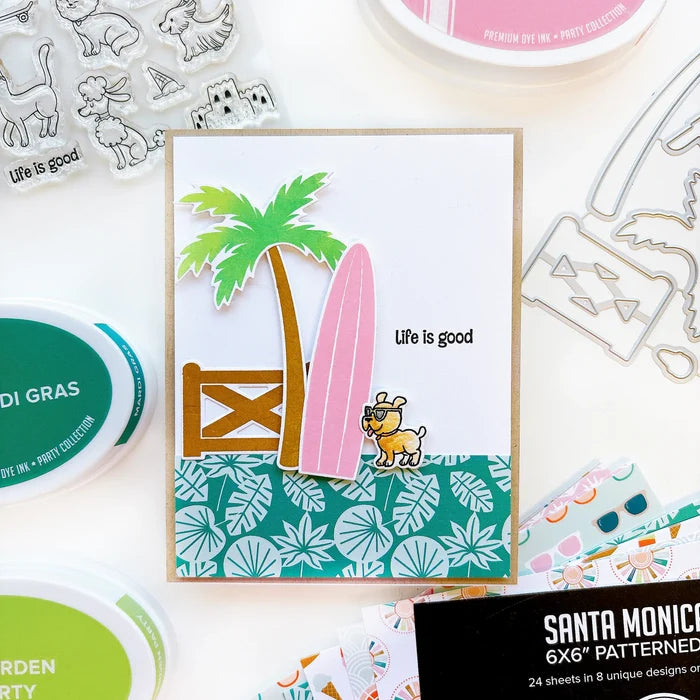 Catherine Pooler - Stamp &amp; Die Set - On the Boardwalk. This set is perfect for building scenes, clustering or simple cards. This set includes a palm tree, surf board, the boardwalk fence and all the bits to build your own treat cart. Available at Embellish Away located in Bowmanville Ontario Canada. Example by Catherine Pooler Designs.
