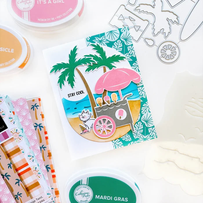 Catherine Pooler - Stamp &amp; Die Set - On the Boardwalk. This set is perfect for building scenes, clustering or simple cards. This set includes a palm tree, surf board, the boardwalk fence and all the bits to build your own treat cart. Available at Embellish Away located in Bowmanville Ontario Canada. Example by Catherine Pooler Designs.
