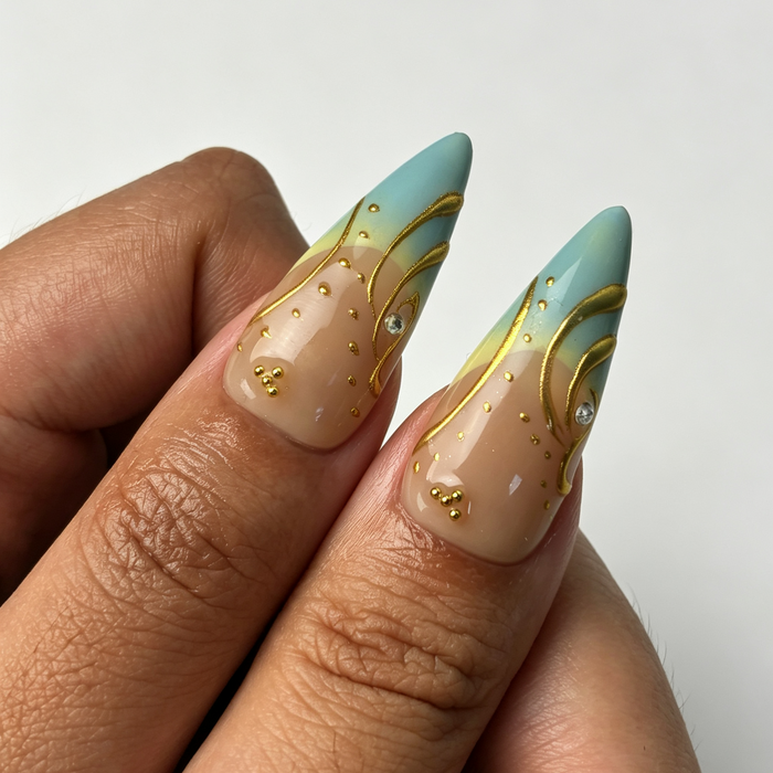Glossy long stiletto press‑on nails, citrus aqua gradient wear effect