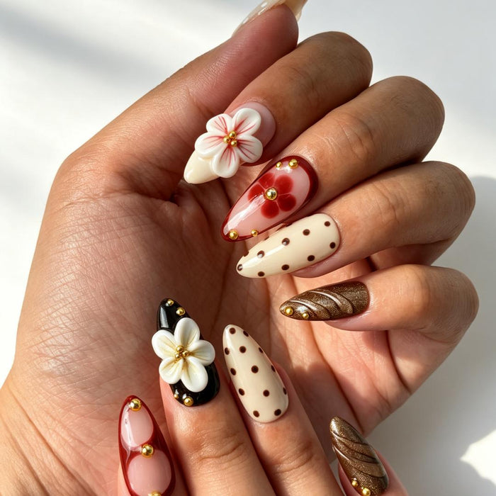 Retro cocoa floral press‑on nails close‑up hand shot