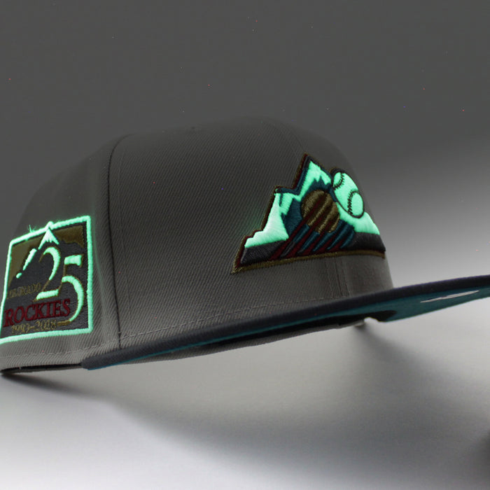 Colorado Rockies 25th Anniversary New Era 59Fifty Fitted Hat (GITD Stone Dark Graphite Teal Under Brim)