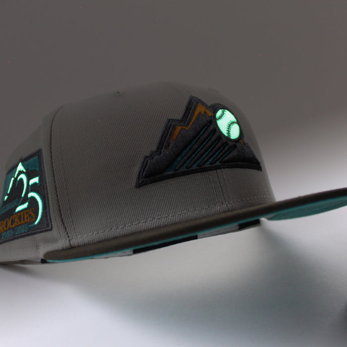 Colorado Rockies 25th Anniversary New Era 59Fifty Fitted Hat (GITD Stone Walnut Teal Under Brim)