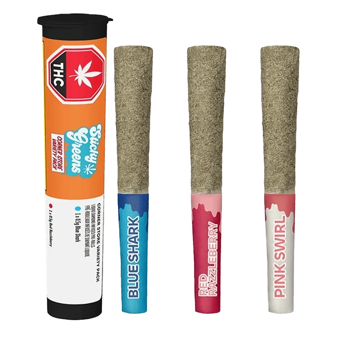Straight-on view of three kief-coated pre-rolls labeled Blue Shark, Red Razzleberry and Pink Swirl beside an orange tube of Corner Store Kief Coated Liquid Diamond Infused PR 3 x 0.5 g.