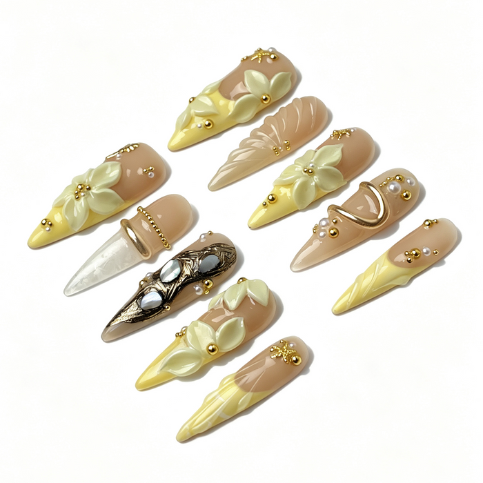 Full set Cream Bloom long stiletto press‑on nails layout