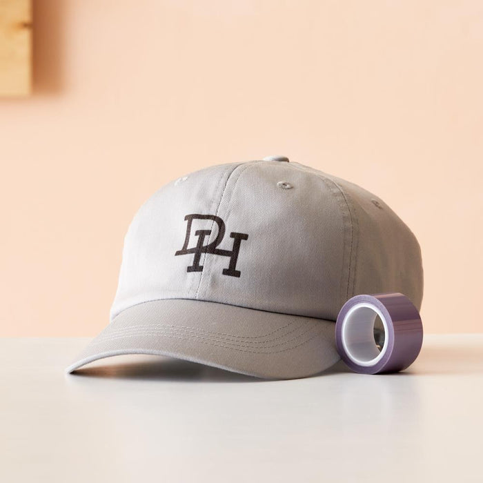 Cricut - Strong Heat Resistant Tape - 1"X33'. With an extra-strength adhesive, Cricut Strong Heat Resistant Tape holds your designs on uneven, unusual, or curved surfaces during the heat transfer process. Available at Embellish Away located in Bowmanville Ontario Canada.