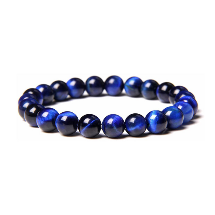 Dark blue tiger eye bead bracelet with silver spacer bead.