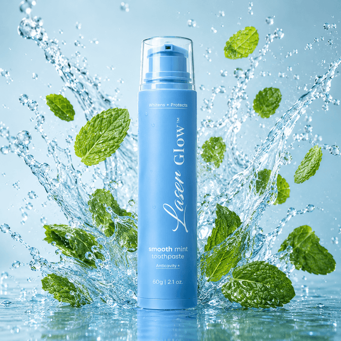 LaserGlow smooth mint fluoride toothpaste with fresh mint leaves and cool water splash for whitening and daily cavity protection