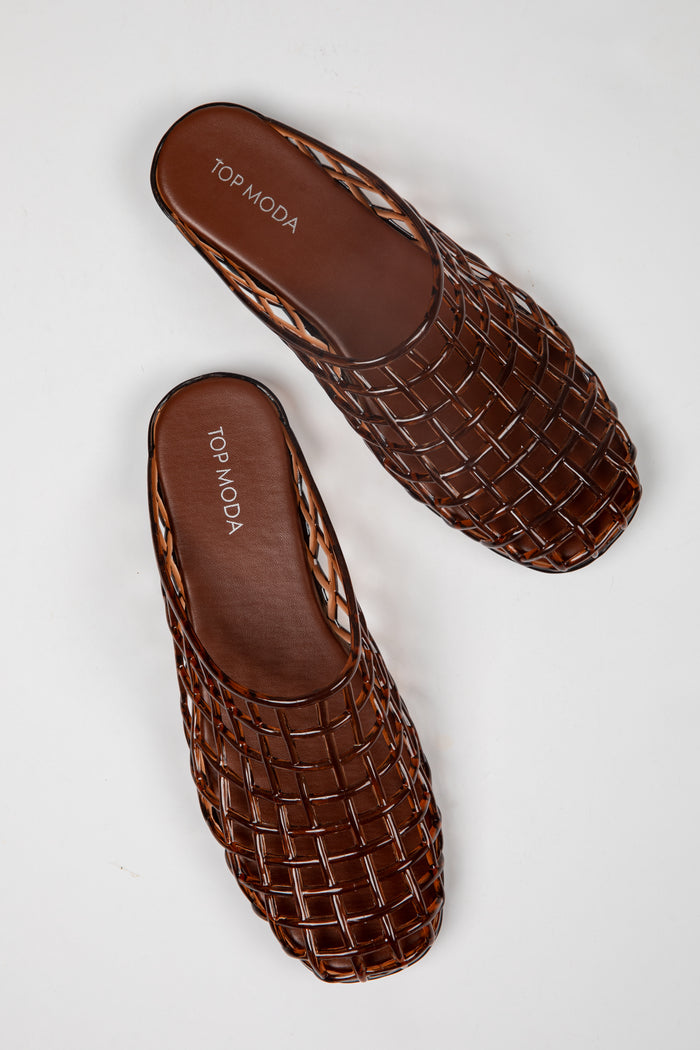 A pair of brown woven leather mule sandals with a square toe, displayed on a clean white background. The brand name 'TOP MODA' is printed on the insole.