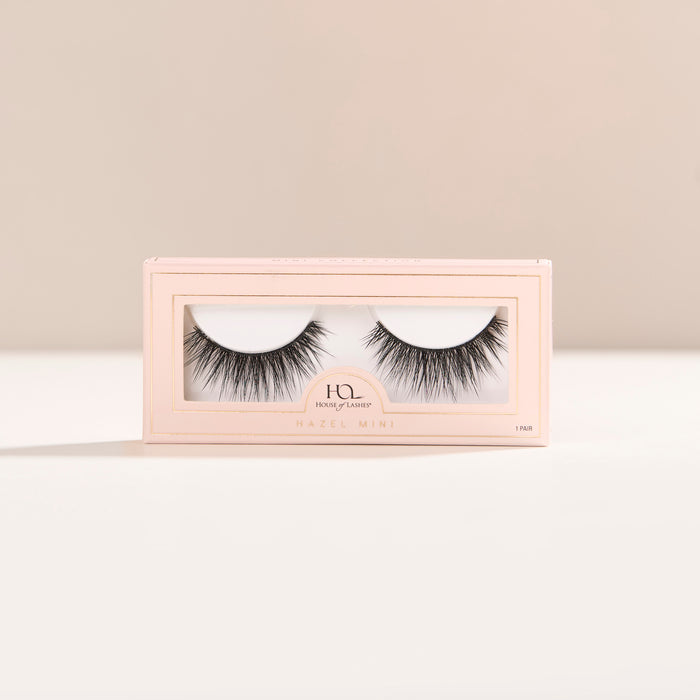 Hazel Mini round false lash with medium volume, short length, and feathery fibers for a “your lashes but better" effect.