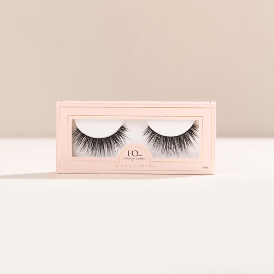 Hazel Mini round false lash with medium volume, short length, and feathery fibers for a “your lashes but better" effect.