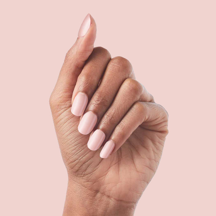 Hand with HZ - Press-On | Short | Squoval rosy neutral false nails for a polished at home mani on medium skin tone