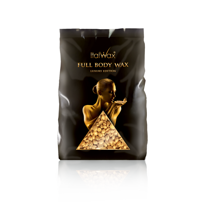 W323 Italwax 1kg Full Body Film Wax | A black stand-up pouch of Italwax Full Body Wax Luxury Edition, featuring a gold-toned illustration of a woman and a triangular window showing gold wax beads, on a white background with a soft reflection.