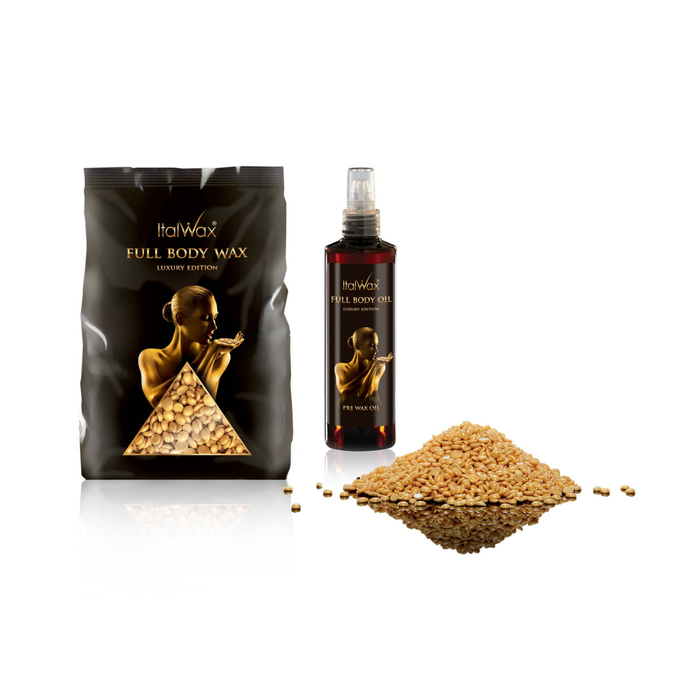 W323 Italwax Full Body Film Wax and Pre-Wax Oil | Italwax Full Body Wax kit featuring a black pouch with 1kg gold film wax, a dark spray bottle containing 250ml full body oil, and a pile of gold hot film wax beads on a white background.