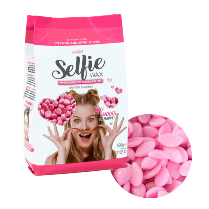 W390 Italwax 500g Selfie Facial Film Wax | A white and pink bag of Italwax Selfie Facial Film Wax with pink wax beads visible in a magnified inset.