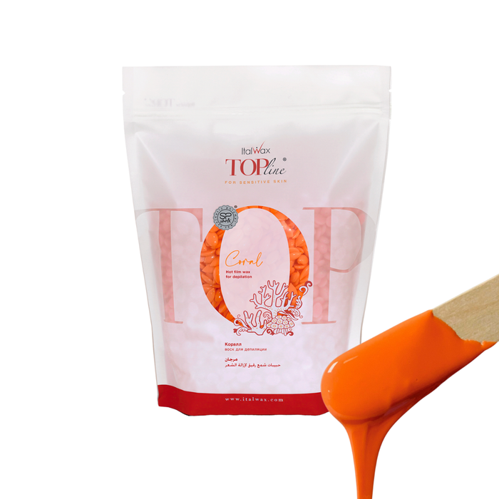 W319 Italwax 1kg Top Line Synthetic Orchid Film Wax | A bag of bright orange Coral film wax in a branded Italwax plastic bag with orange wax beads showing, and in the foreground a wooden spatula with bright orange wax dripping