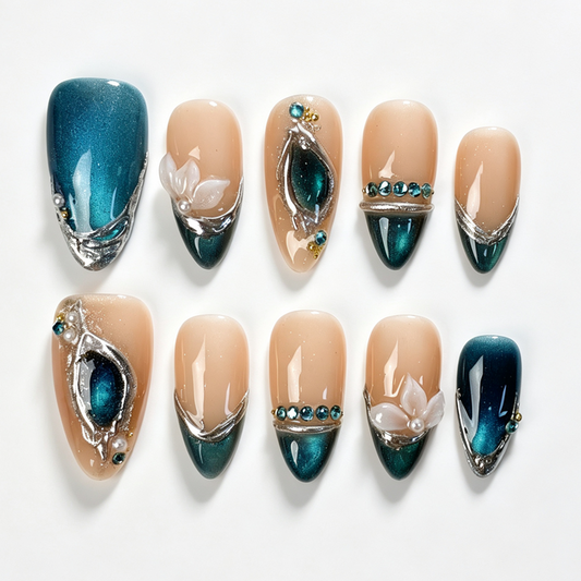 Jade Lotus Mirror medium almond press on nails, nude teal jade cat eye french tip, silver foil frame, white lotus flower, rhinestone and pearl decor