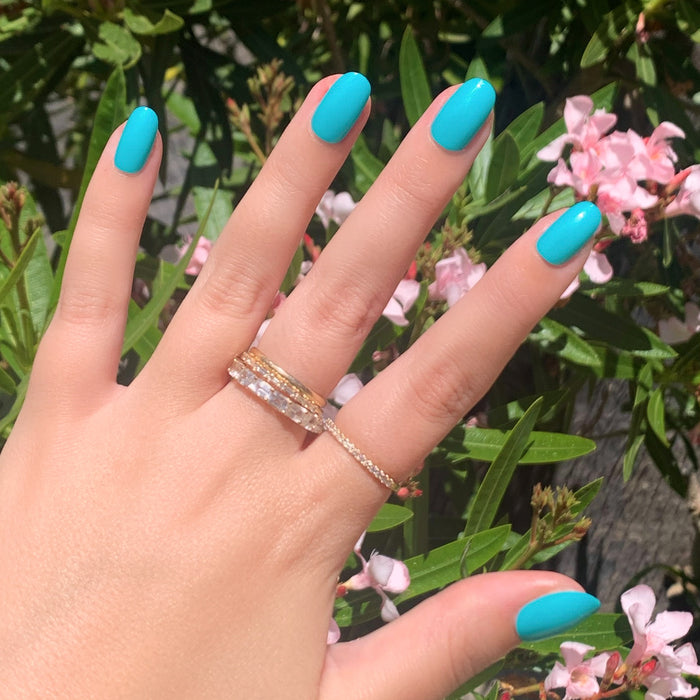 Jewel Pop | Round | Short vibrant nearly neon turquoise blue press on nails in short round shape for a summer mani