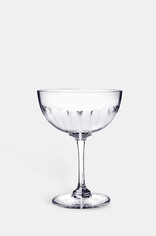 The Vintage List lens champagne saucer with band of connecting oval detailing.