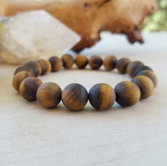 Matte Tiger Eye bead bracelet with gold-plated spacer, handcrafted.