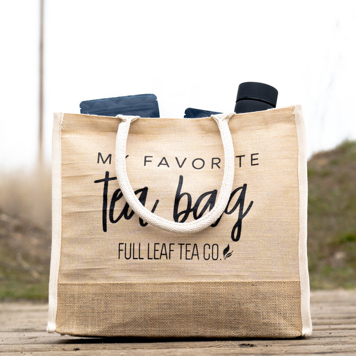 A "My Favorite Tea Bag" Tote Bag filled with some Full Leaf Tea Company items.