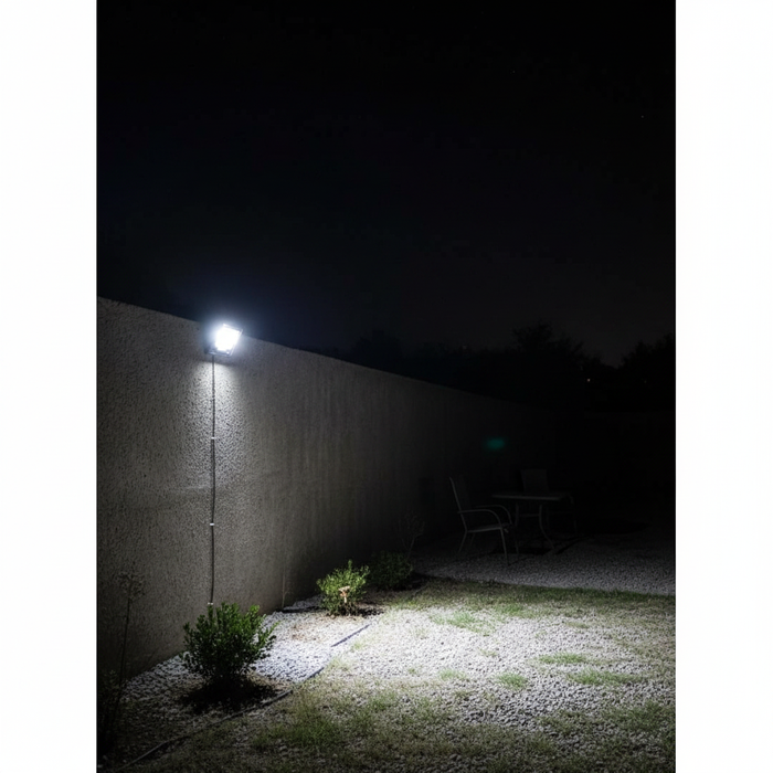 Neelux 50W LED flood light illuminating outdoor area at night