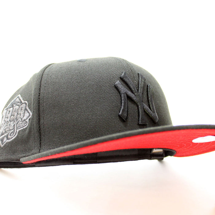 New York Yankees 1999 World Series Black Logo New Era 59Fifty Fitted Hat (Black Red Under Brim)