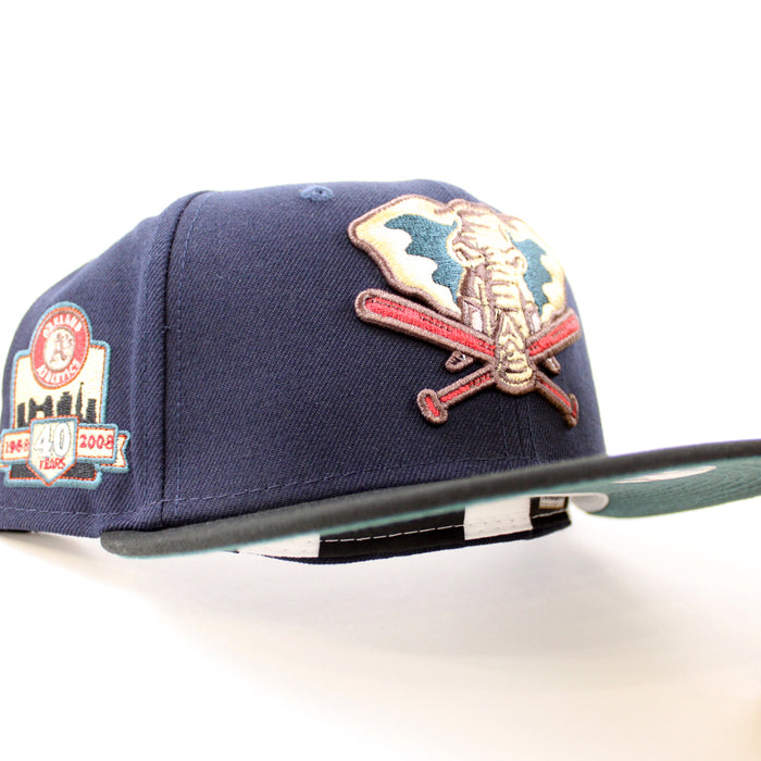 Oakland Athletics 40 YEARS New Era 59Fifty Fitted Hat (NIGHT SHIFT NAVY BLACK PINE NEEDLE GREEN Under Brim)