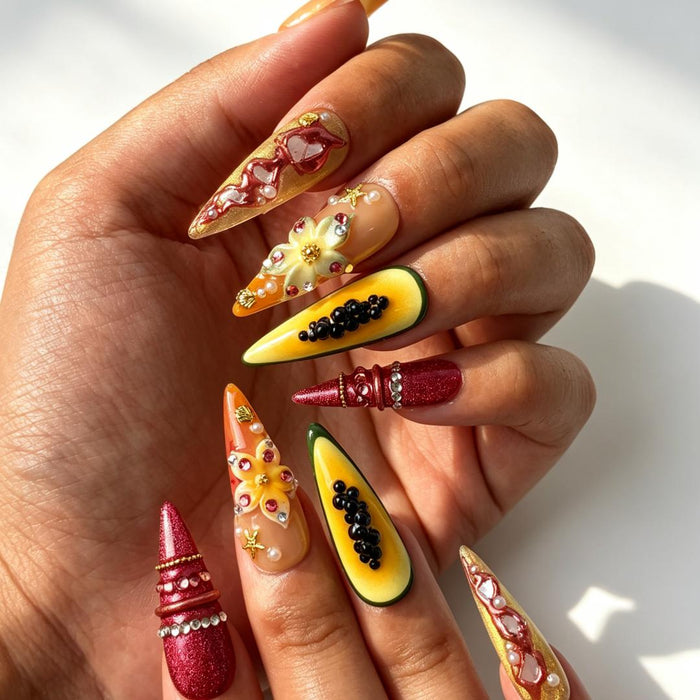 Summer tropical flower press‑on nails close‑up hand shot