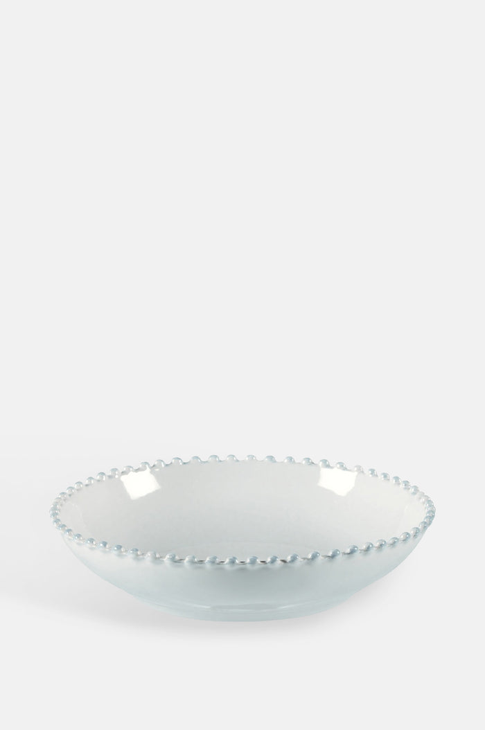 Costa Nova pearl white pasta plate with curved edges and pearl edging.