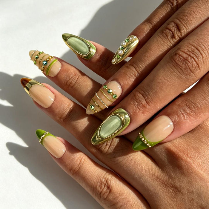Luxury gilded sage green almond press‑on nails on hand