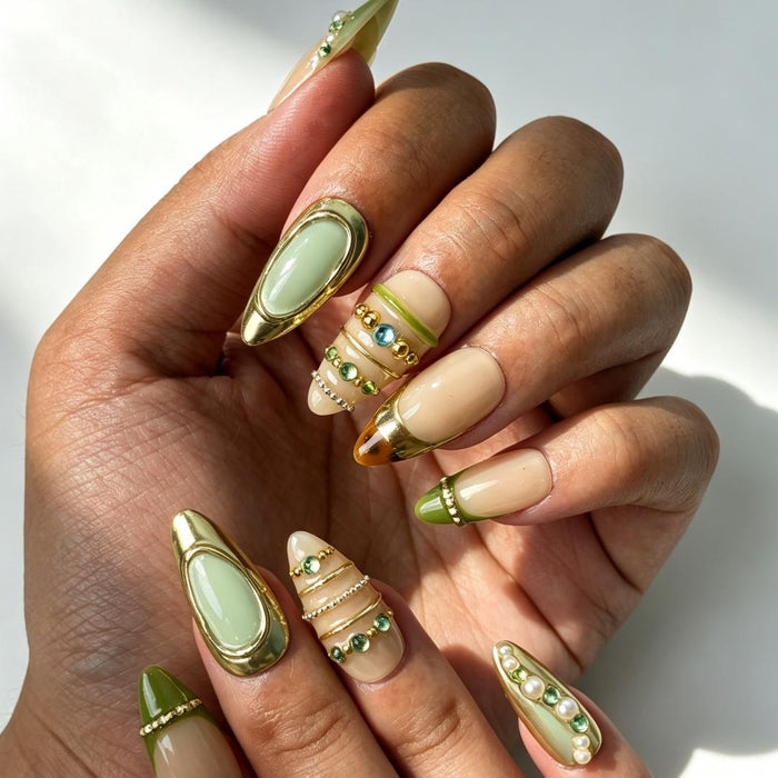 Elegant sage‑green gold press‑on nails close‑up hand shot