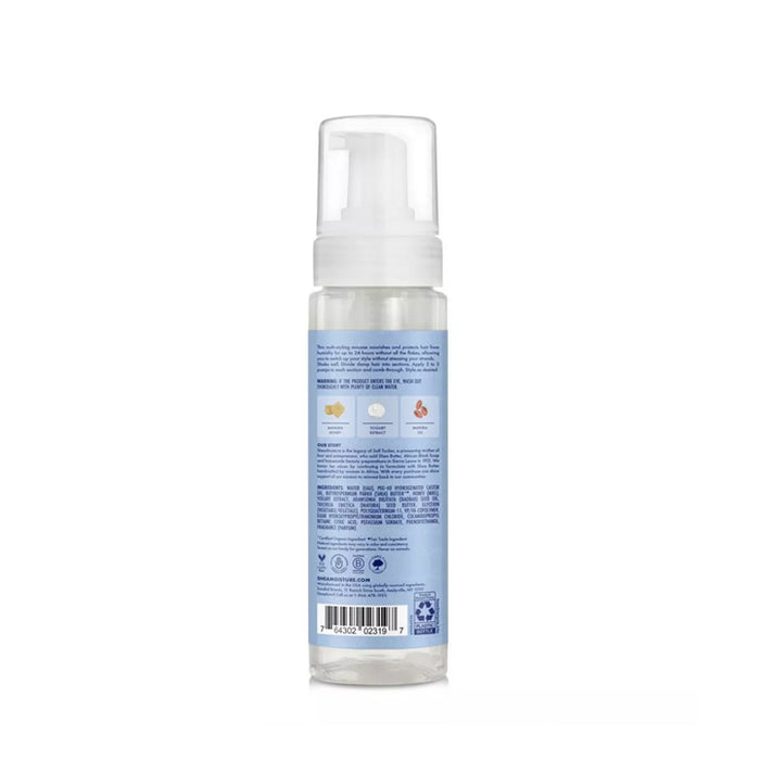 Back view of Shea Moisture Manuka Honey mousse clear pump bottle with blue ingredient label for hair care