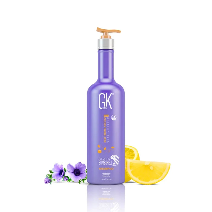 GK Hair Silver Bombshell Shampoo 710 ml purple pump bottle with purple anemones and lemon slices on white