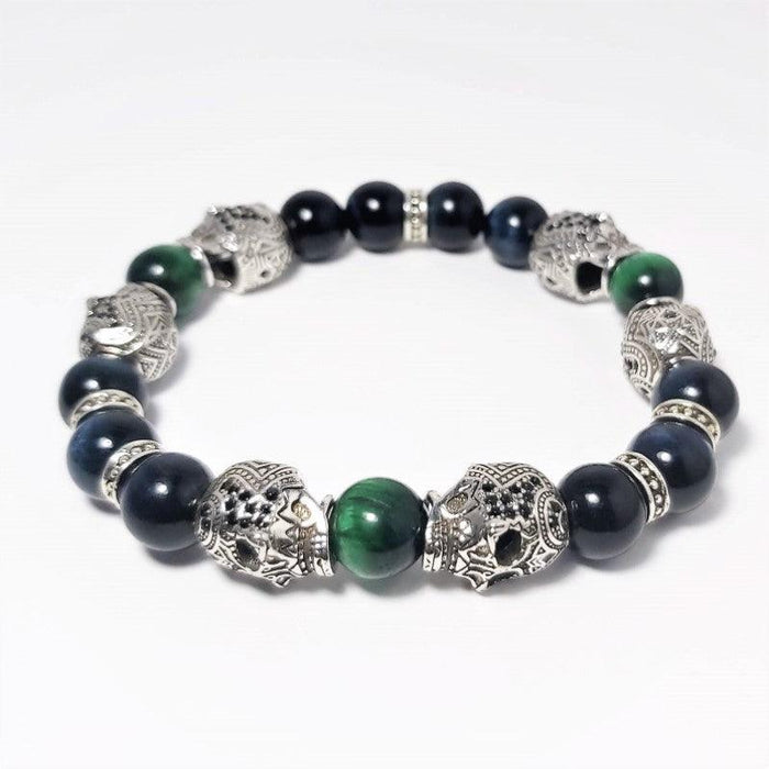 Skull and Natural Stone Beads BraceletDESCRIPTION
 This stone has powerful metaphysical properties that will help to shield you against negativity. The energy of these stones may stimulate the gift of prBead BraceletsT.M.JTheodore Men's JewelrySkull and Natural Stone Beads