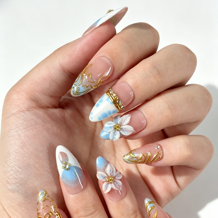 Sky Gilded gentle medium almond false nails close-up, nude cloud blue gradient 3D flower rhinestone manicure