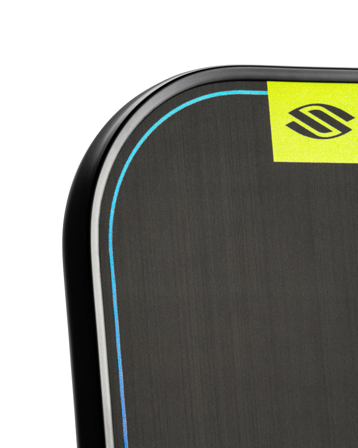 Close-up of the EdgeSentry low-profile edge guard on a pickleball paddle.