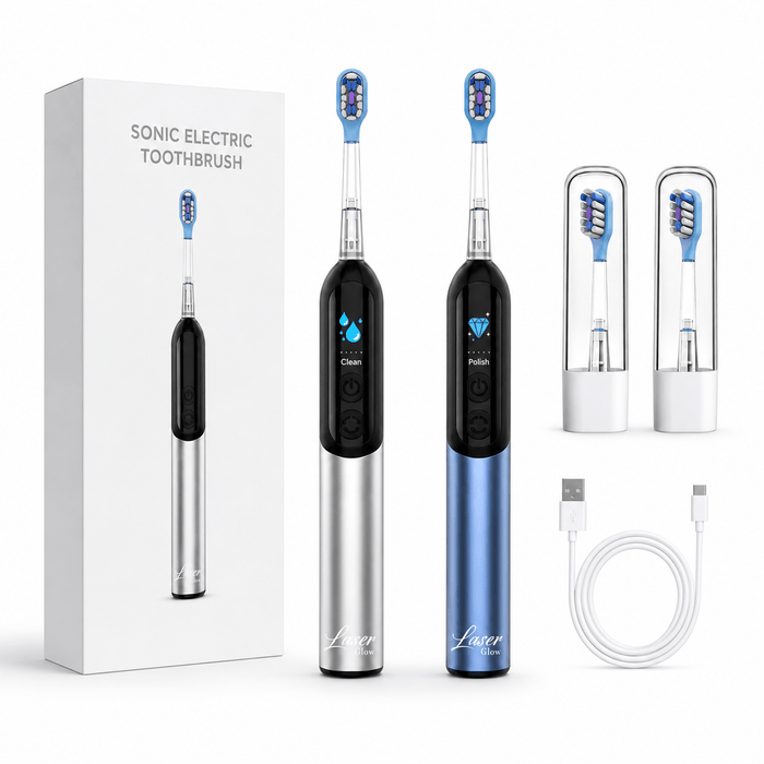 LaserGlow sonic electric toothbrush kit with silver and blue handles, black upper bodies, product box, two brush heads, and USB charger