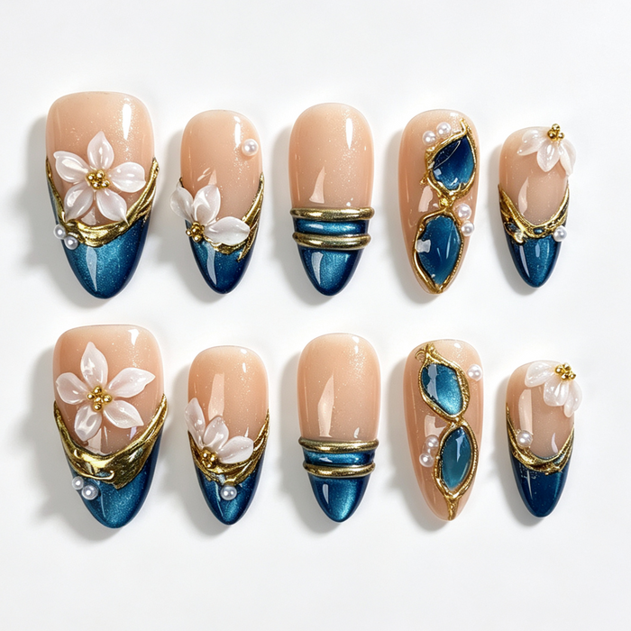 Teal‑Petal medium almond press‑on nails, nude teal cat‑eye, white translucent flower, gold metal frame and pearl decor fake nails