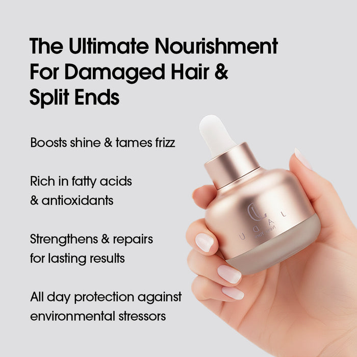 Hand holding Jadu Split Ends Care nourishing hair oil for damaged ends