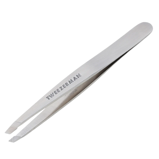 Tweezer with 'Tweezerman' branding on a white background